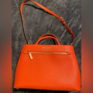 Michael Kors- leather satchel. Lt terractta/burnt orange color. Great condition!